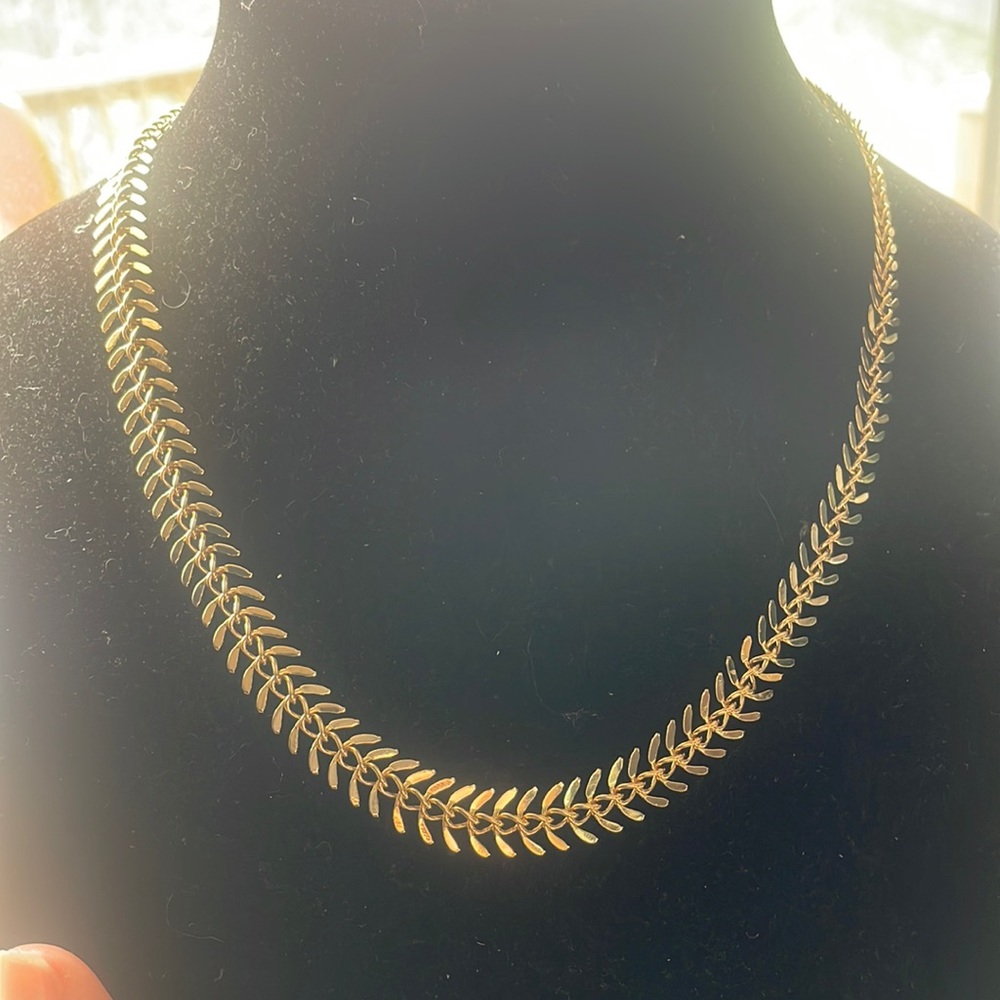 Shiny gold tone fish bone necklace